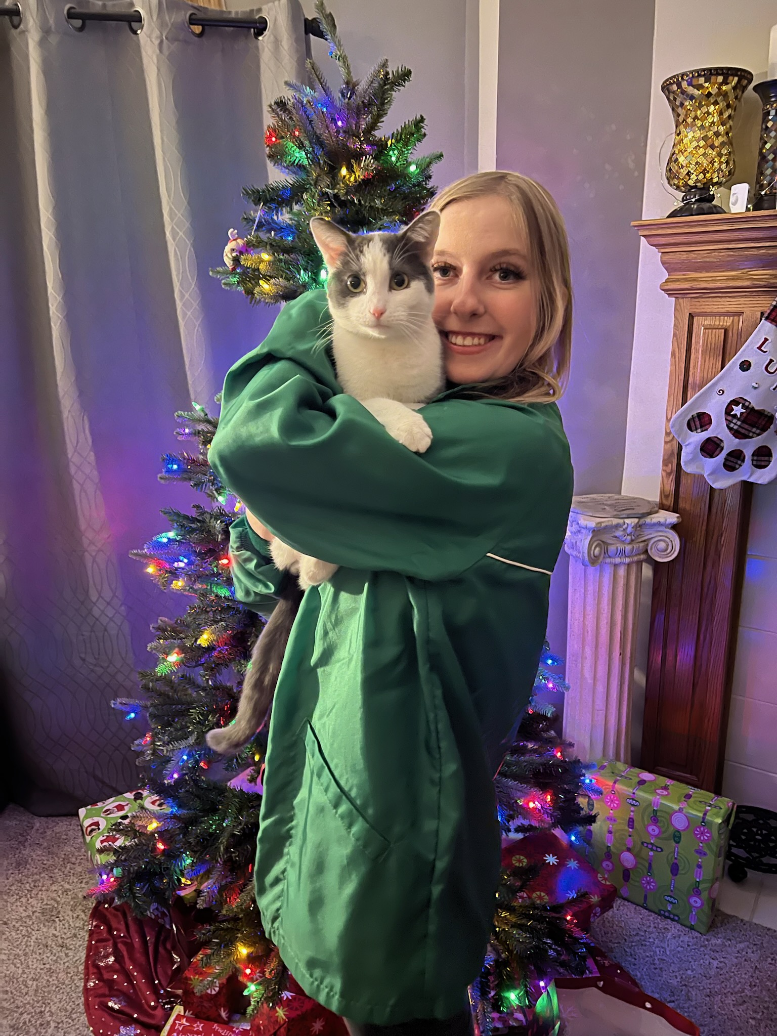 Sydney holding her pet cat Moose